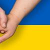 Hender over det ukrainske flagget